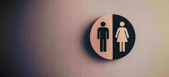 black and white male, female toilet sign.
