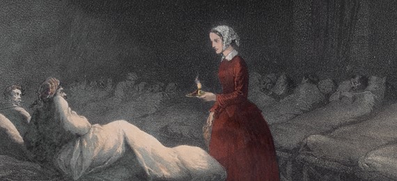 Illustration of Florence Nightingale holding a candle in a hospital with patients lying in beds.